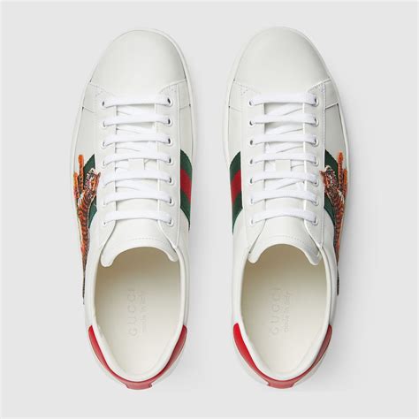 gucci white new ace sneakers|gucci ace tiger sneakers.